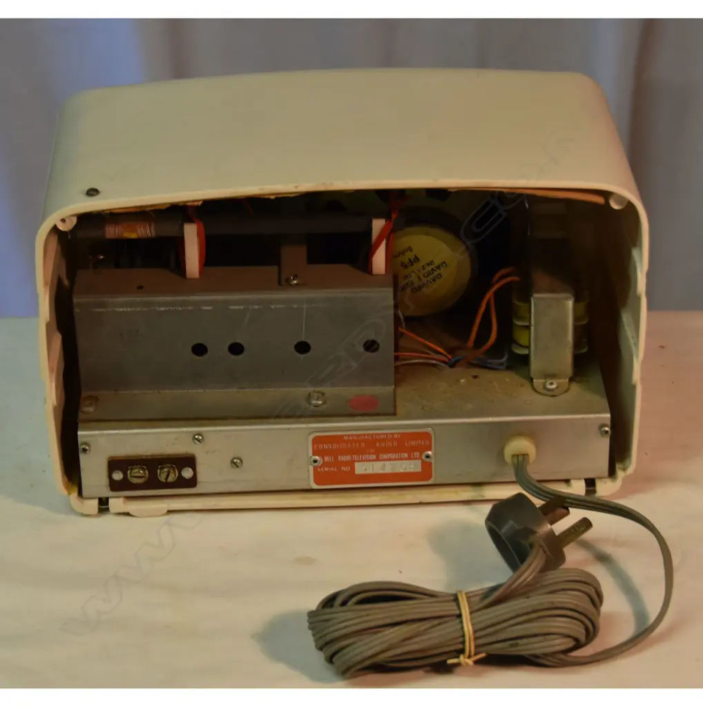 Model Colt, transistorised, by Bell, cream plastic. H.175mm Image 1++