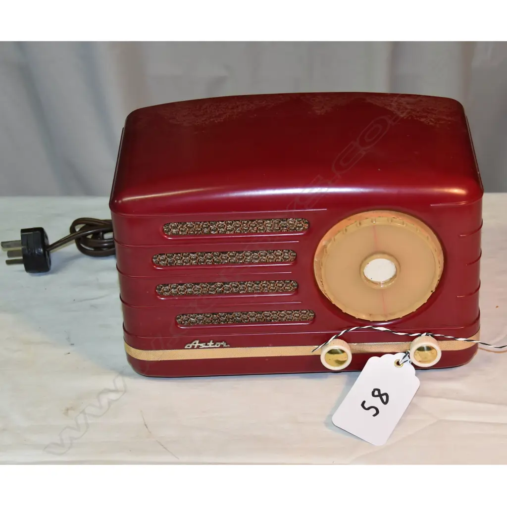 Model  Astor FEU, by PYE (NZ) Ltd., red plastic, discoloured. H.180mm Image 1++