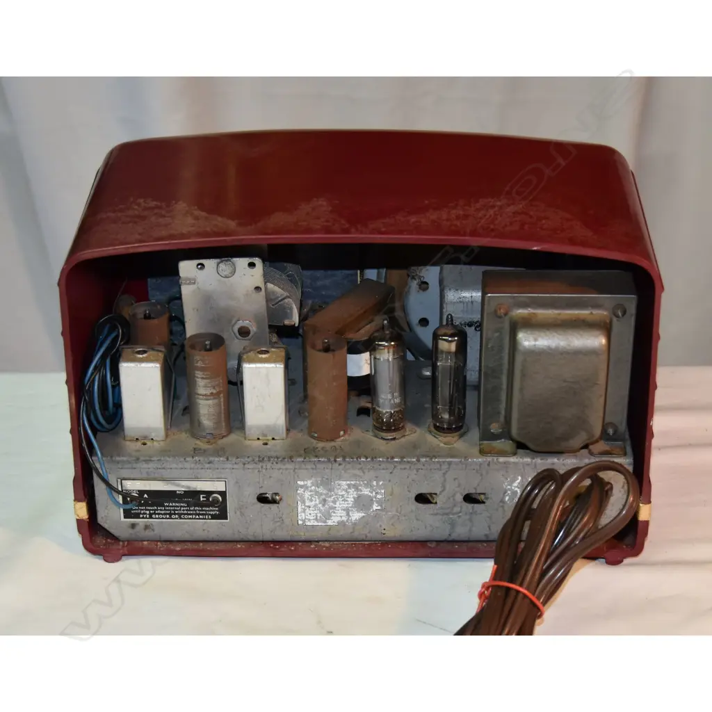 Model  Astor FEU, by PYE (NZ) Ltd., red plastic, discoloured. H.180mm Image 1++