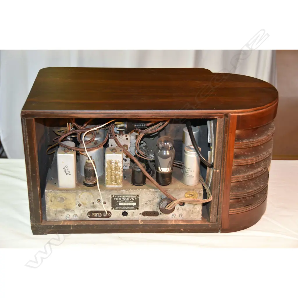 Model R146X, by Stewart Warner, wood. H.285mm Image 1++