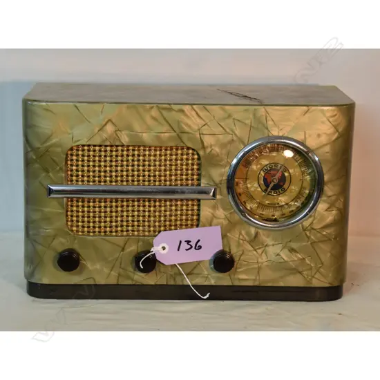 Model Model A  (M.O.P.), by World Radio, Mother of Pearl vinyl on wood. A/F. H.280mm