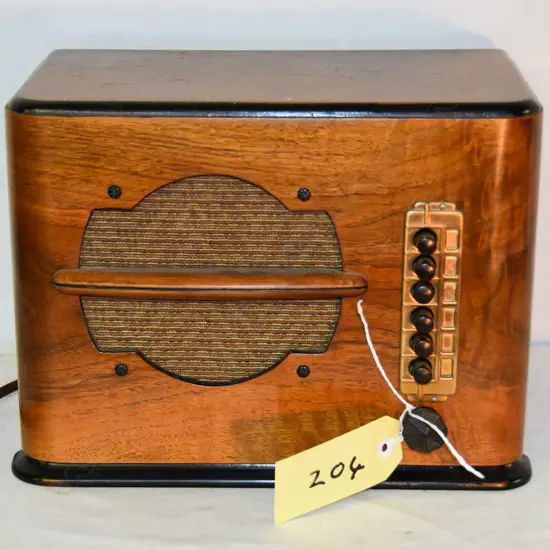 Model 'Push Button wonder’, by ?, Wood, pushbutton tuning only. H.240mm