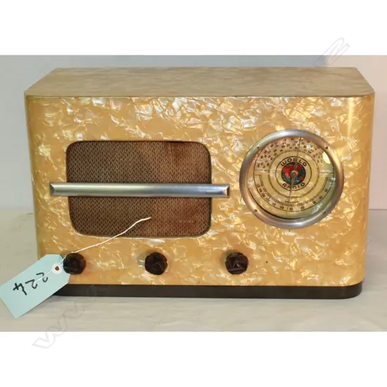 Model World (M.O.P.), by World Radio, Mother of Pearl Vinyl on wood. H.270mm