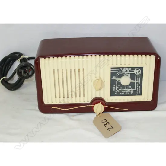 Model PZ100, by Pye, Red and cream. H.160mm