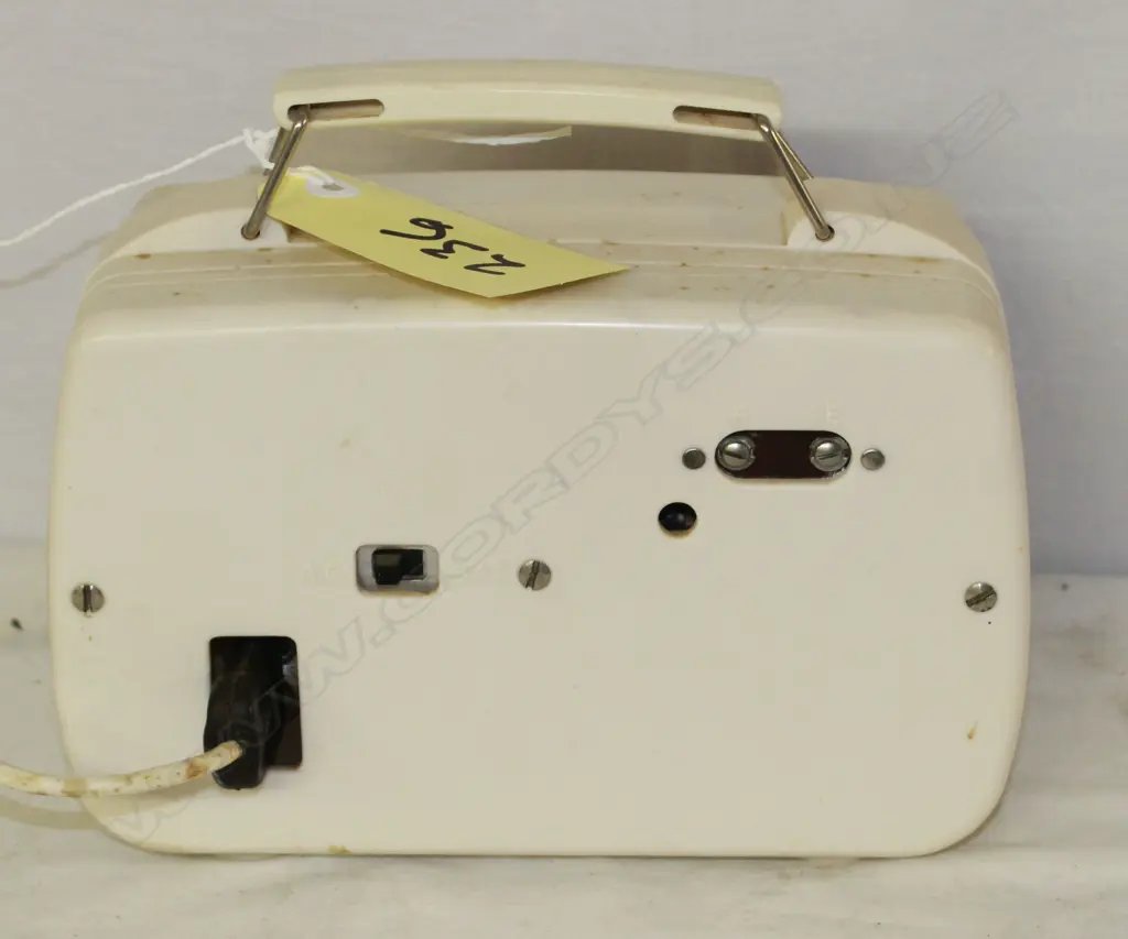 Model Ultimate portable, by Radio (1936) Ltd , White. H.165mm Image 1++