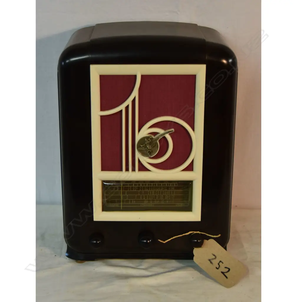 Model Model 50, by Airzone (1931) Ltd., Bakelite Brown, White Grill. H.360mm Image 1++