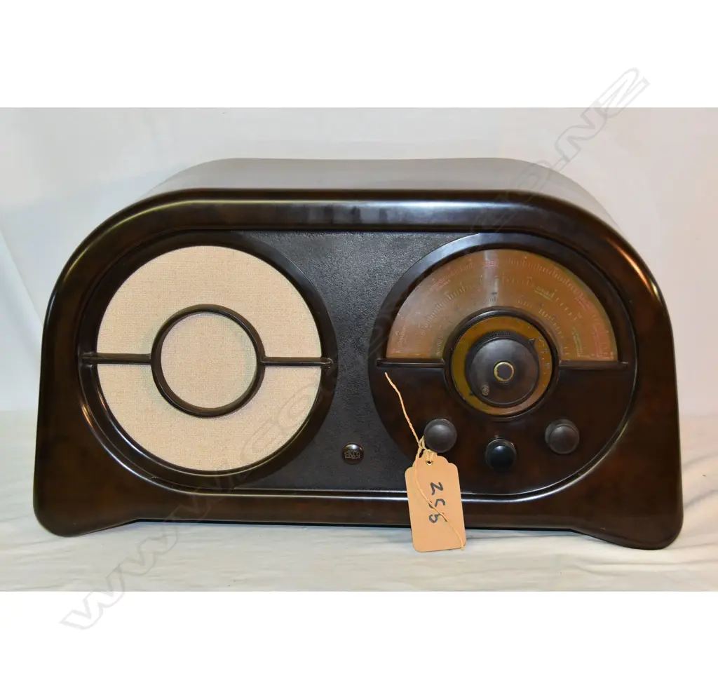 Model SW86, by EKCO, Bakelite Brownrepaired Crack. H.310mm Image 1++