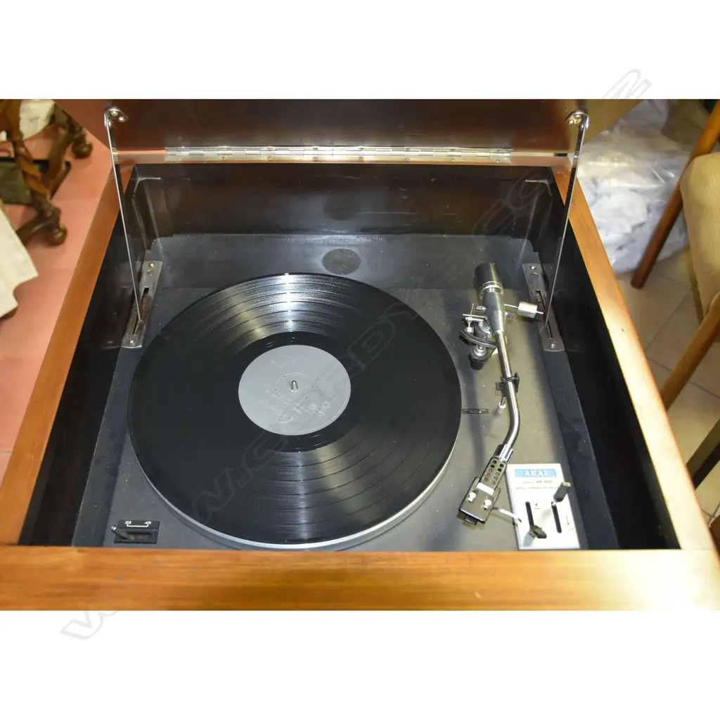 Model AP-002 Belt-drive turntable , by Akai, Turntable (only) in wood console. H.950mm Image 1++