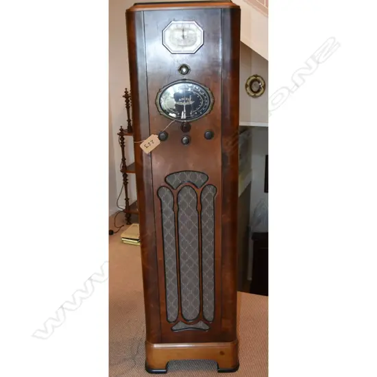 Model Radio-Clock, by Ariel, Wood console. H.1585mm