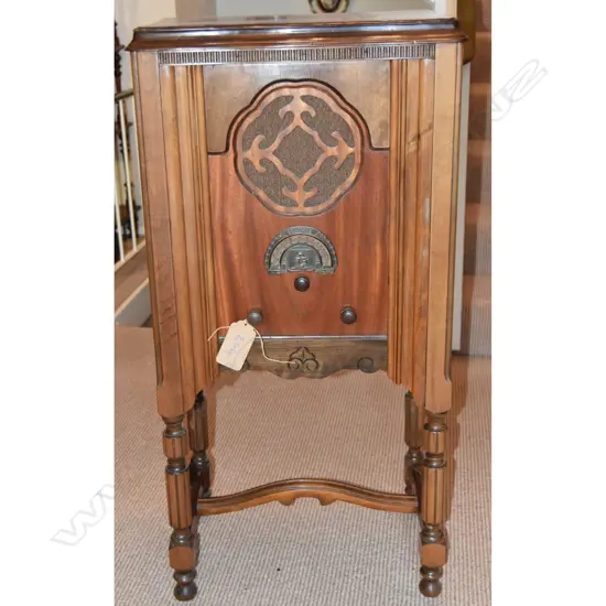 Model Ultimate, by Radio (1936) Ltd , Wood console. H.1030mm