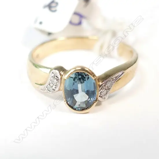 9CT CEYLONESE SAPPHIRE & DIAMOND RING