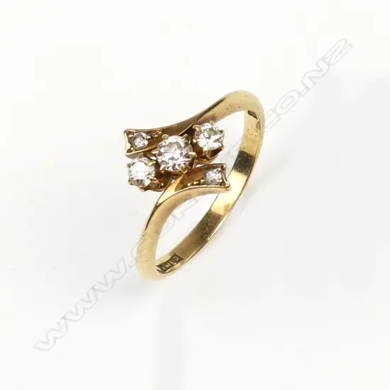 An 18ct. yellow gold and multi-diamond set vintage ring