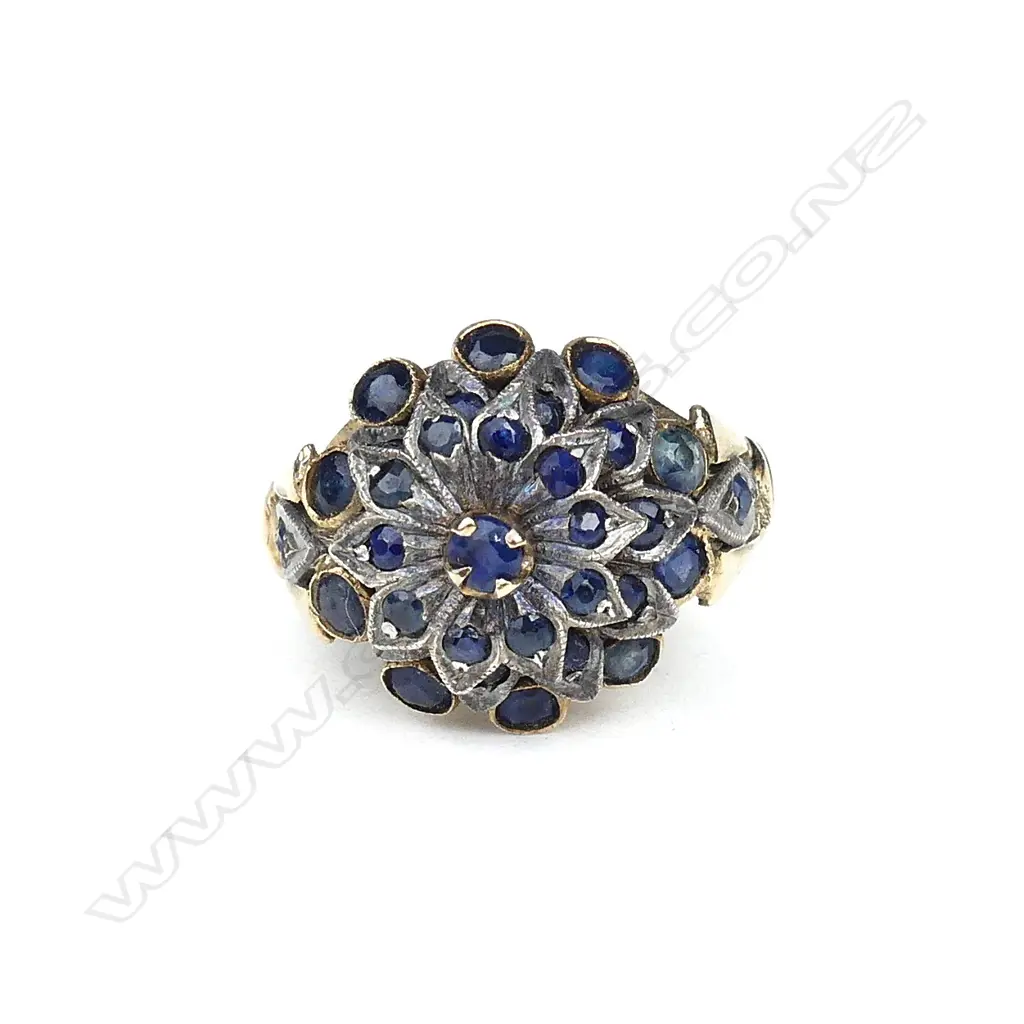 A vintage 14ct. yellow gold and multi-sapphire princess type cocktail ring Image 1++
