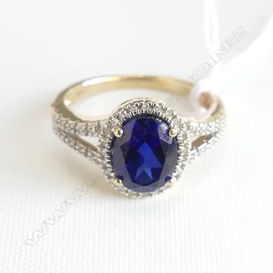 9CT SYNTHETIC SAPPHIRE & REAL DIAMOND RING