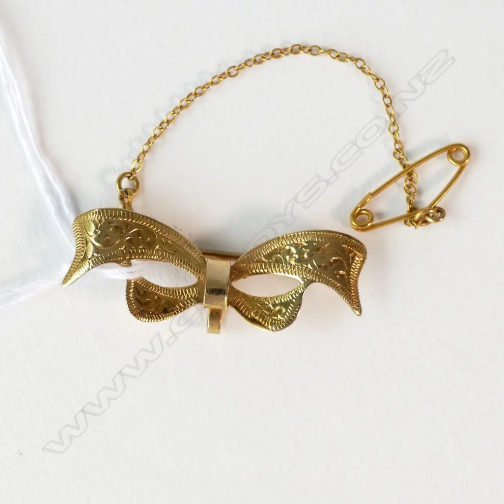 9CT GOLD BOW BROOCH 2.38GM Image 1++
