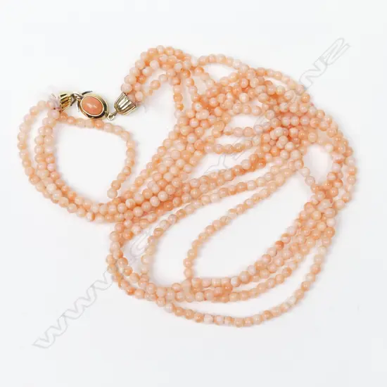 A vintage angel skin coral necklace