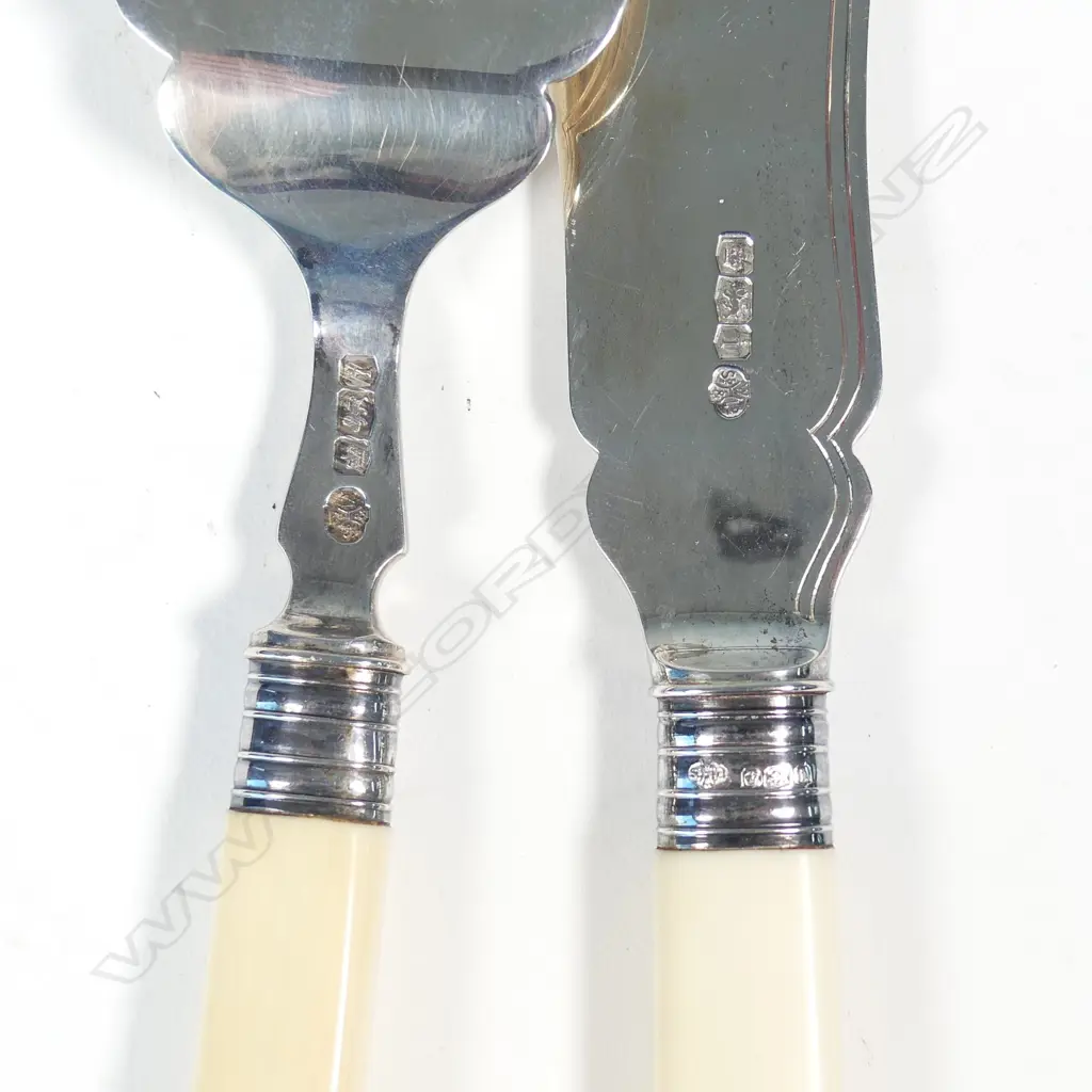 A pair of silver fish servers with ivory handles Image 1++