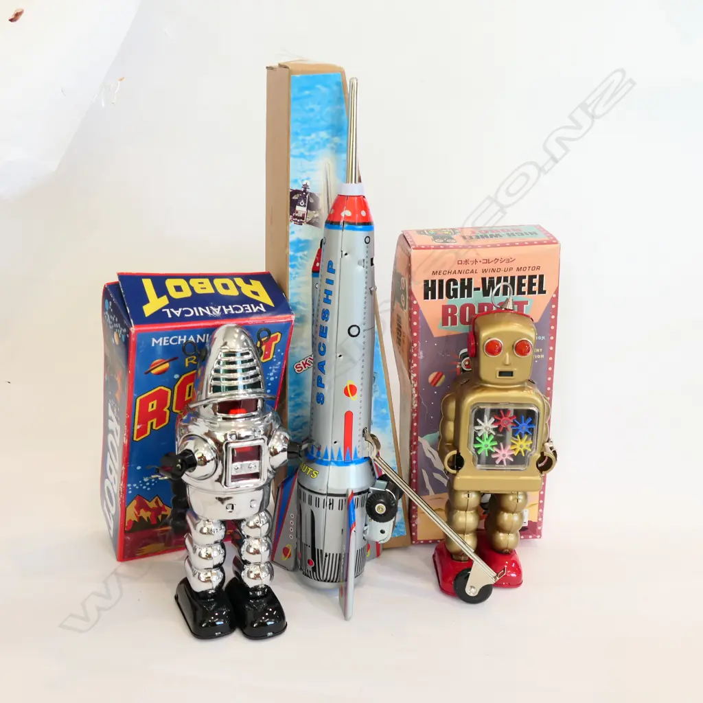 3 CONTEMPORARY CHINESE TOYS; ROBY ROBOT, HIGH WHEEL ROBOT, SKYEXPRESS ROCKET Image 1++