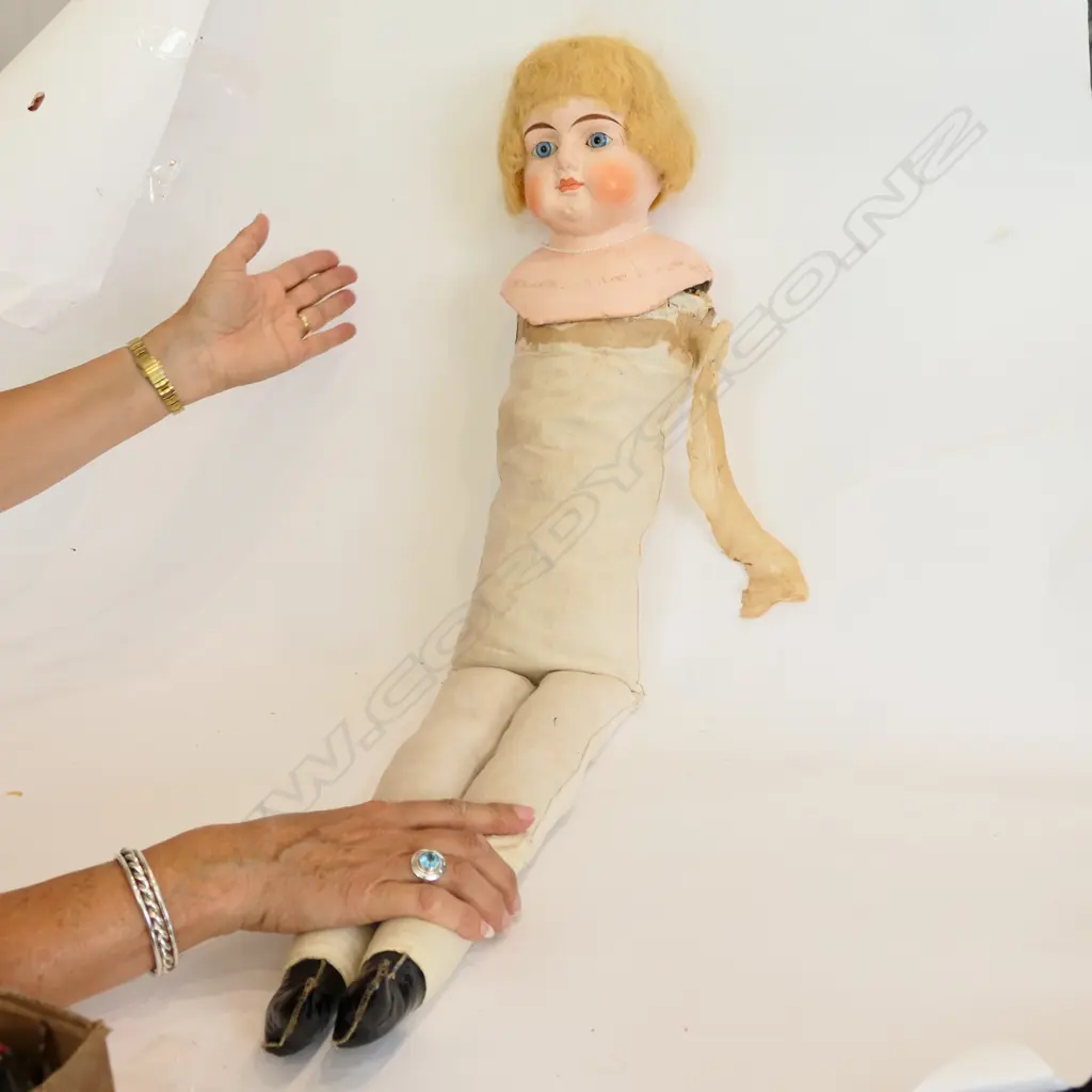 PORCELAIN HEAD DOLL WITH CLOTH BODY Image 1++