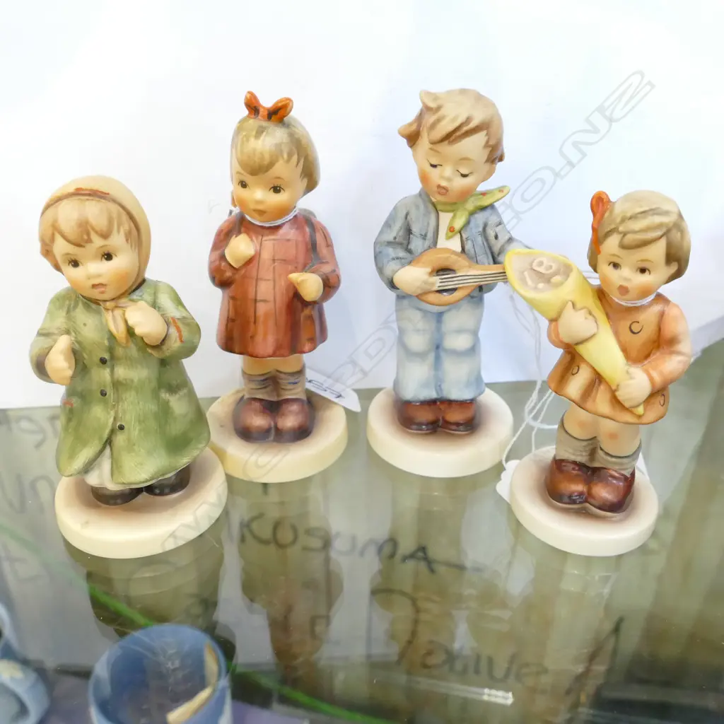 4 BOXED HUMMEL FIGURINES Image 1++