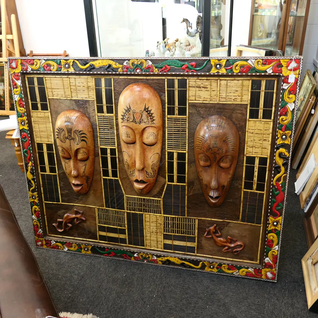 LARGE FRAMED LOMBOK 3 CARVED HEADS W.1147MM X 1180MM FADED  Image 1++