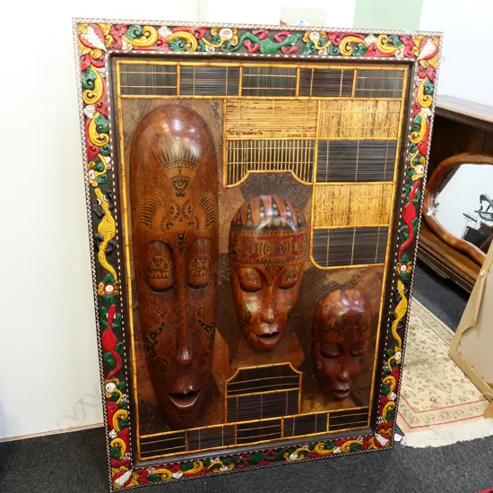 LARGE FRAMED LOMBOK 3 CARVED HEADS W.980MM X 1038MM