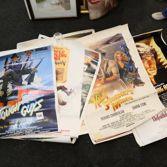 10 1990'S MOVIE POSTERS INCL TOUGH GUYS, ROMANCING THE STONE ETC