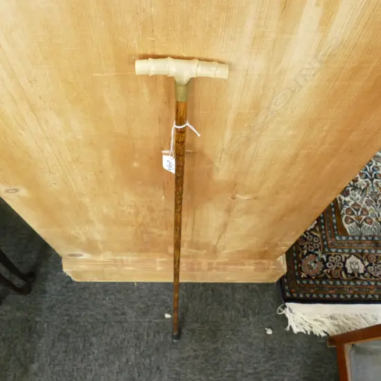 GENTLEMAN'S WALKING STICK - IVORY AND BRASS HANDLE