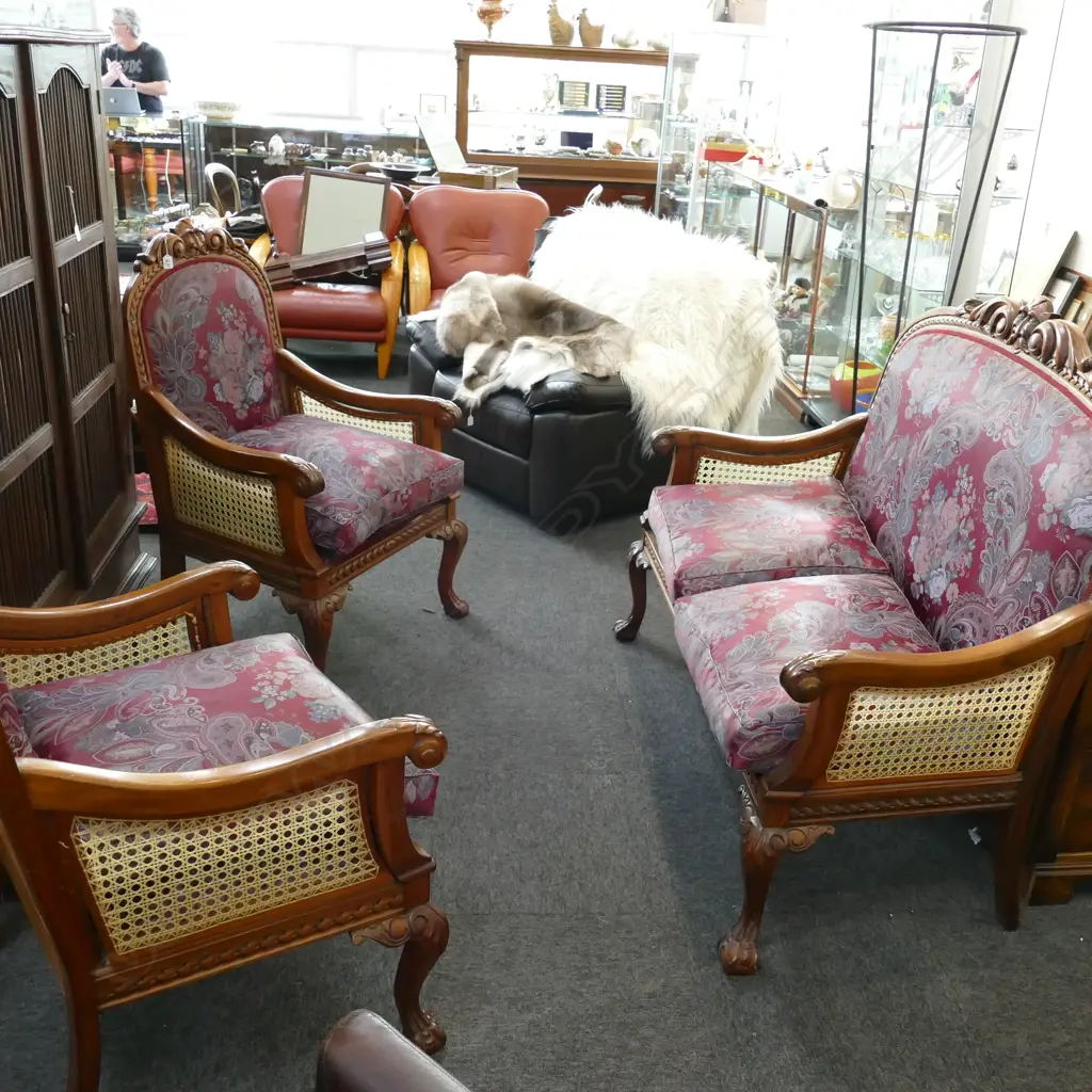 3 PC CARVED LOUNGE SUITE - 2 SEATER + 2 CHAIRS IN RED FLORAL WITH CANE SIDES Image 1++