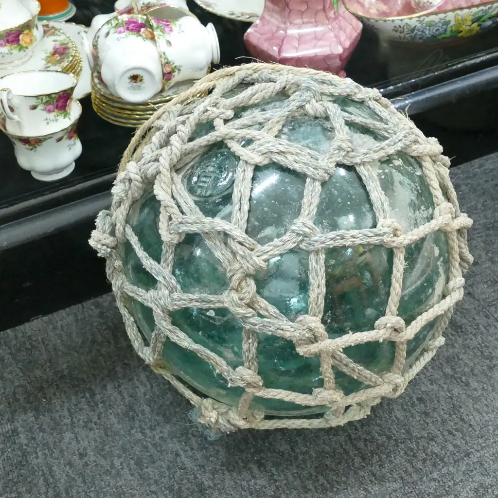 OLD LARGE GLASS FISHING FLOAT WITH NETTING... Image 1++