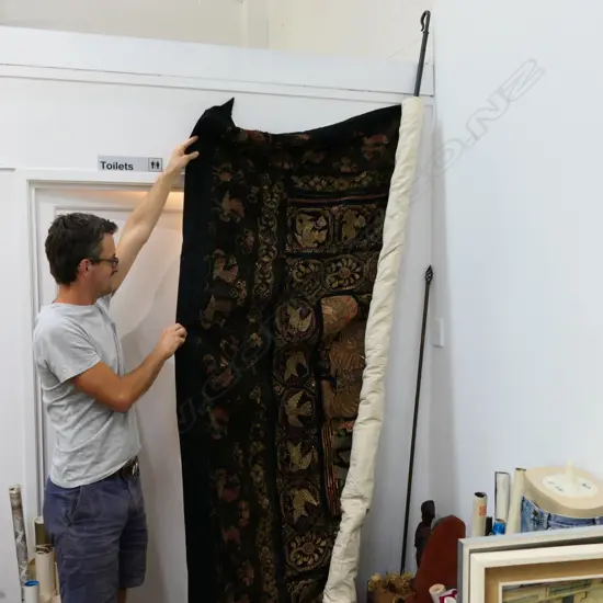 THAI EMBROIDERED WALL RUG DEPICTING 3 FIGURES WITH MANY BORDERED DESIGN 1800MM H 2660MM L