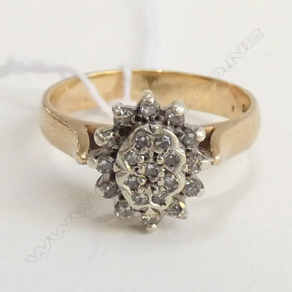 9CT & DIAMOND CLUSTER RING OVAL FLORET TOP Image 1++