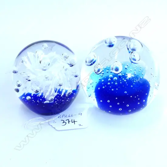 TWO PAPERWEIGHTS