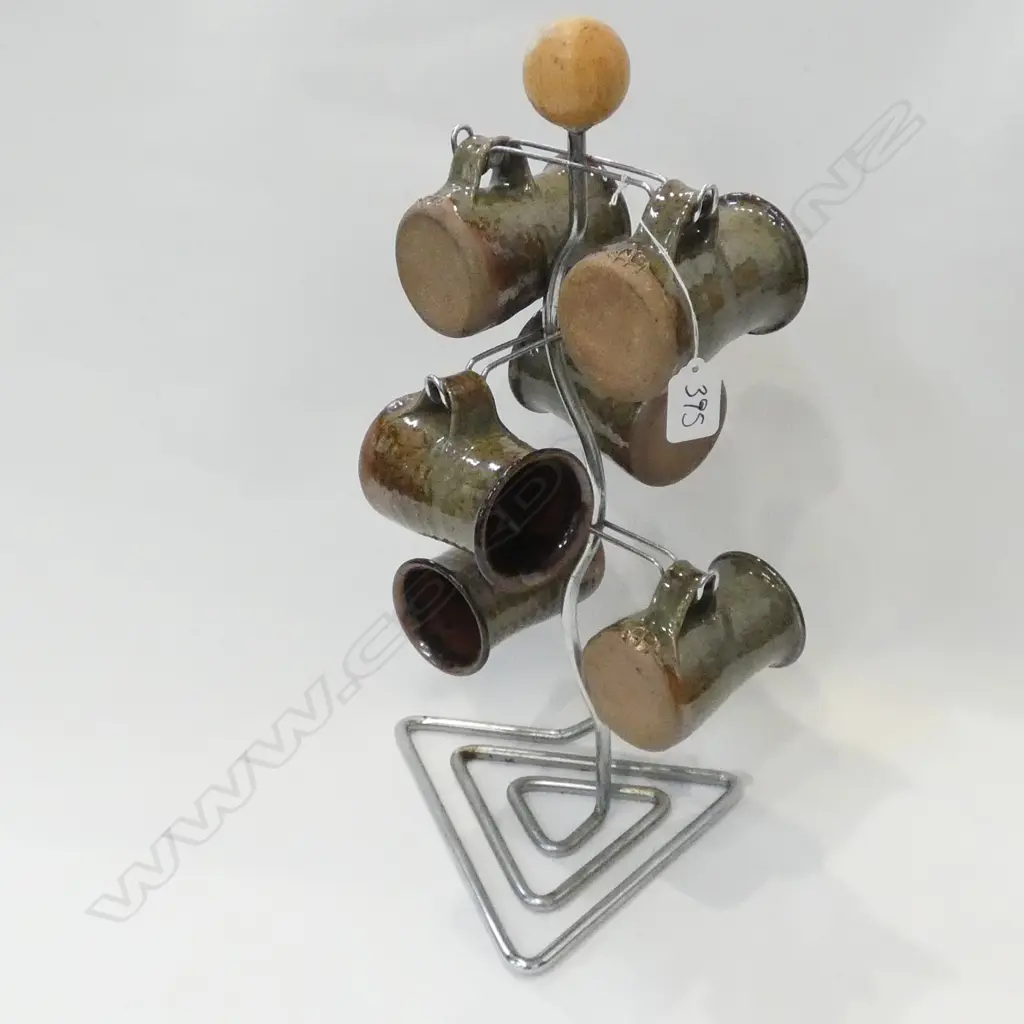 6 PC ANDREW VAN DER PUTTEN COFFEE MUG AND STAND Image 1++