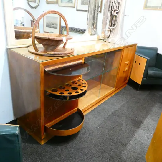 AMERICAN ART DECO WALNUT COCKTAIL CABINET WITH REVOLVING CELLARET  L. 2130MM