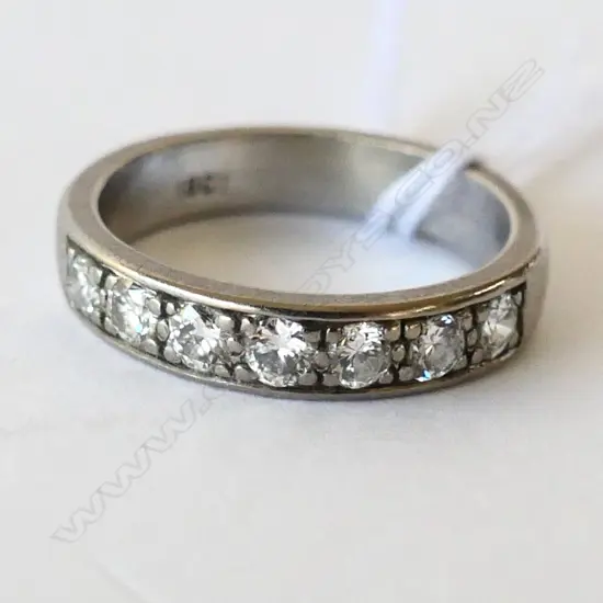 18CT WHITE GOLD AND DIAMOND BAND 4.88gm