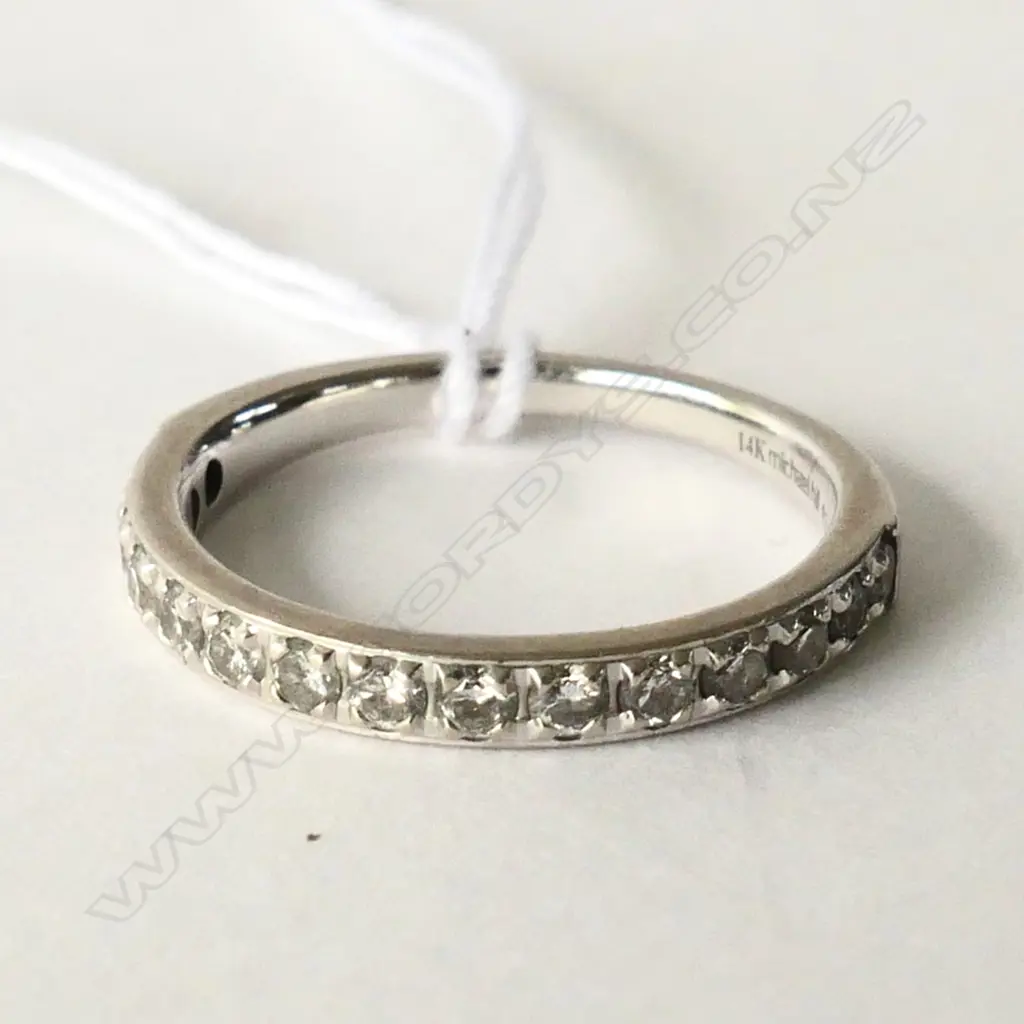 14CT WHITE GOLD AND DIAMOND BAND TDW 0.34CT. Image 1++