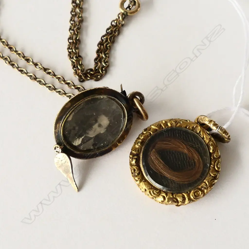 TWO ANTIQUE PINCHBECK MOURNING PENDANTS Image 1++