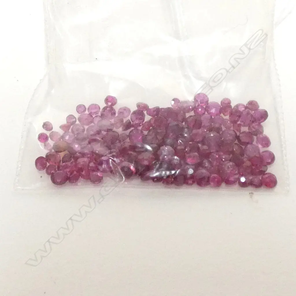 10 CT ROUND FACETED RUBIES Image 1++