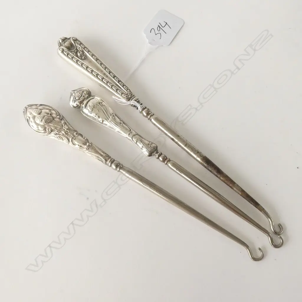 THREE SILVER HANDLED BUTTON HOOKS Image 1++