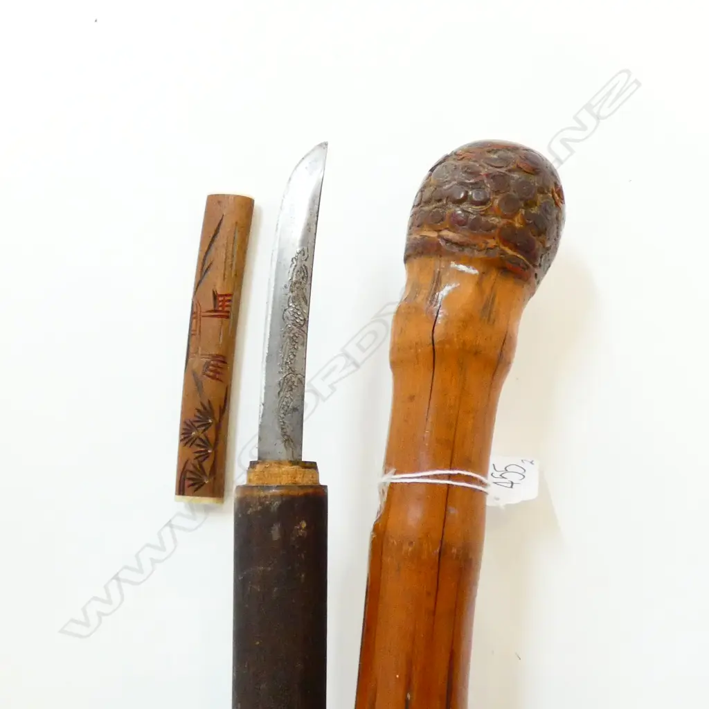 2 OLD ORIENTAL CARVED WALKING STICKS... Image 1++