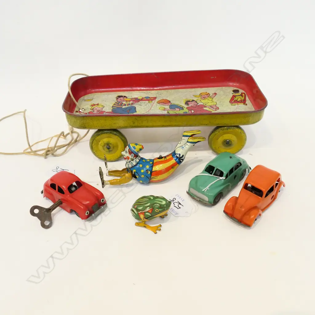 ASSORTED TOYS INCL 3 MINIC CARS, 2 WIND UP TIN PLATE AND WAGON ON CORD Image 1++
