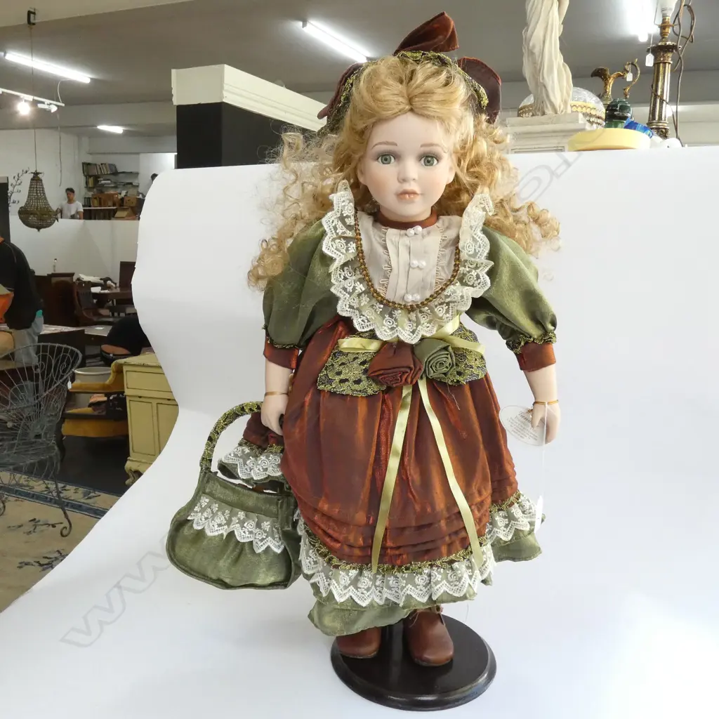 MODERN PORCELAIN COLLECTOR'S DOLL KAREN. ON STAND Image 1++