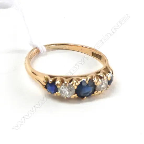 18CT DIAMOND AND SAPPHIRE RING