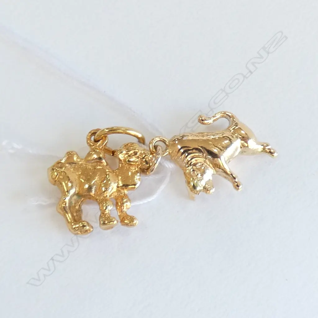 2 GOLD CHARMS CAMEL & BULL 9CT OR HIGHER Image 1++
