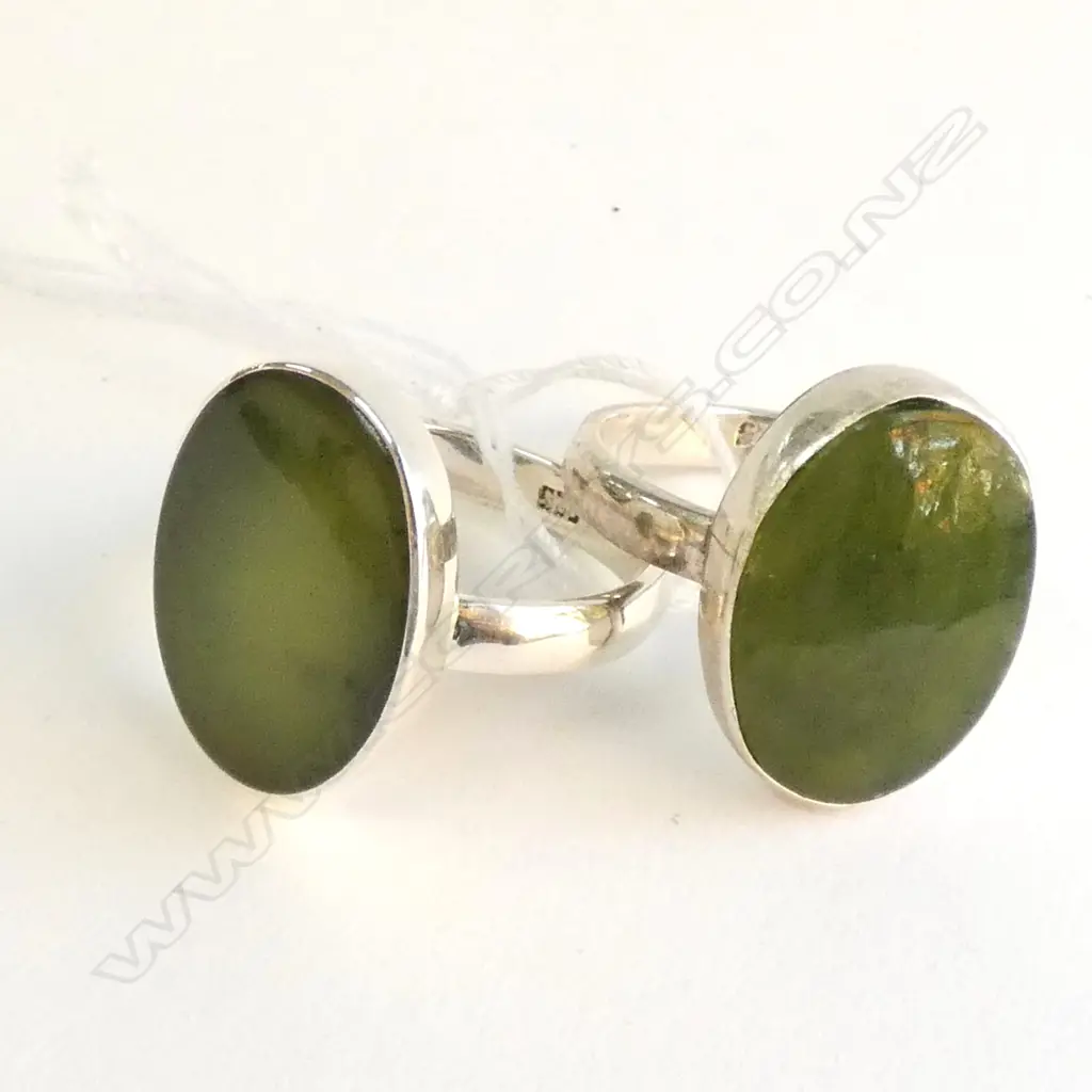 TWO STERLING SILVER POUNAMU RINGS Image 1++