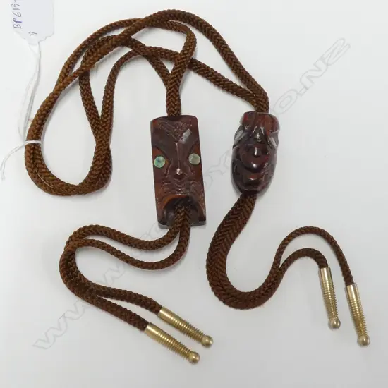 A PR OF MAORI CARVED SHIRT TIES