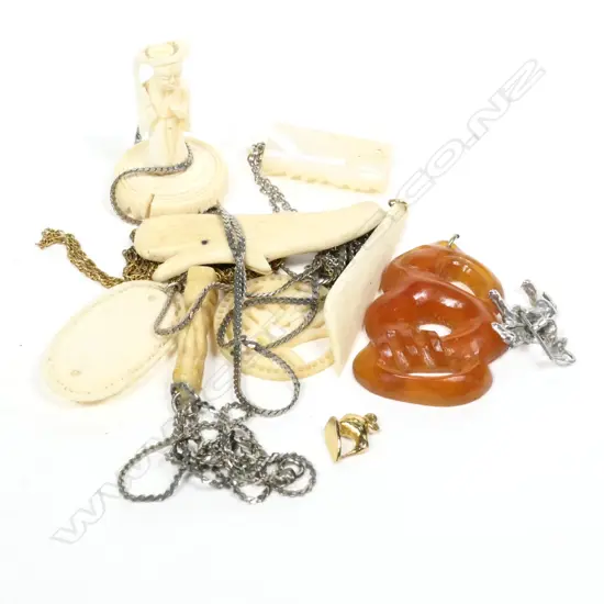 10 CARVED BONE ETC PENDANTS ETC