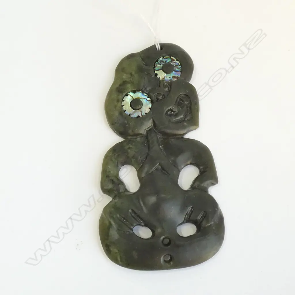 HEI TIKI POUNAMU. GREENSTONE TIKI,PAUA EYES 95MM.DARK TRANSLUCENT STONE. Image 1++