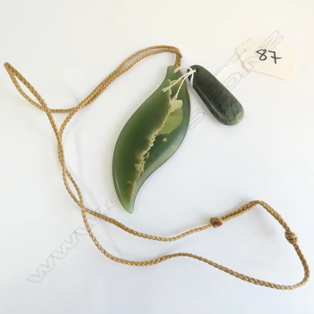 TWO GREENSTONE POUNAMU PENDANTS.LONGEST 85MM. Image 1++